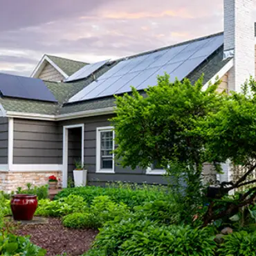 a house with solar panels on the roof