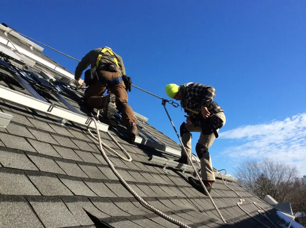 a group of men on a roof