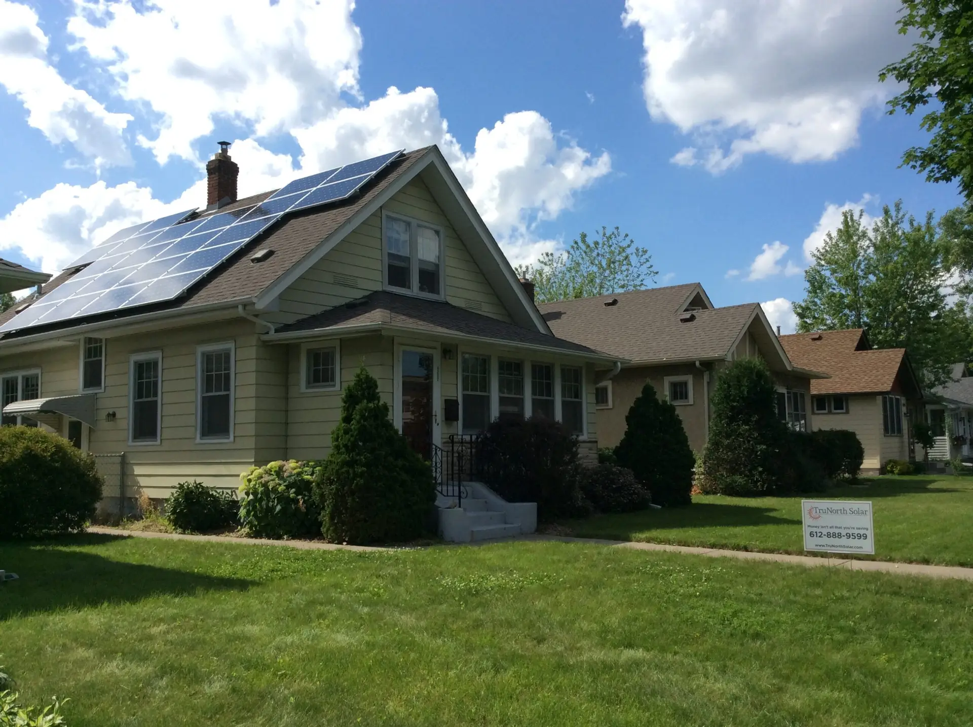 a house with solar panels on the roof