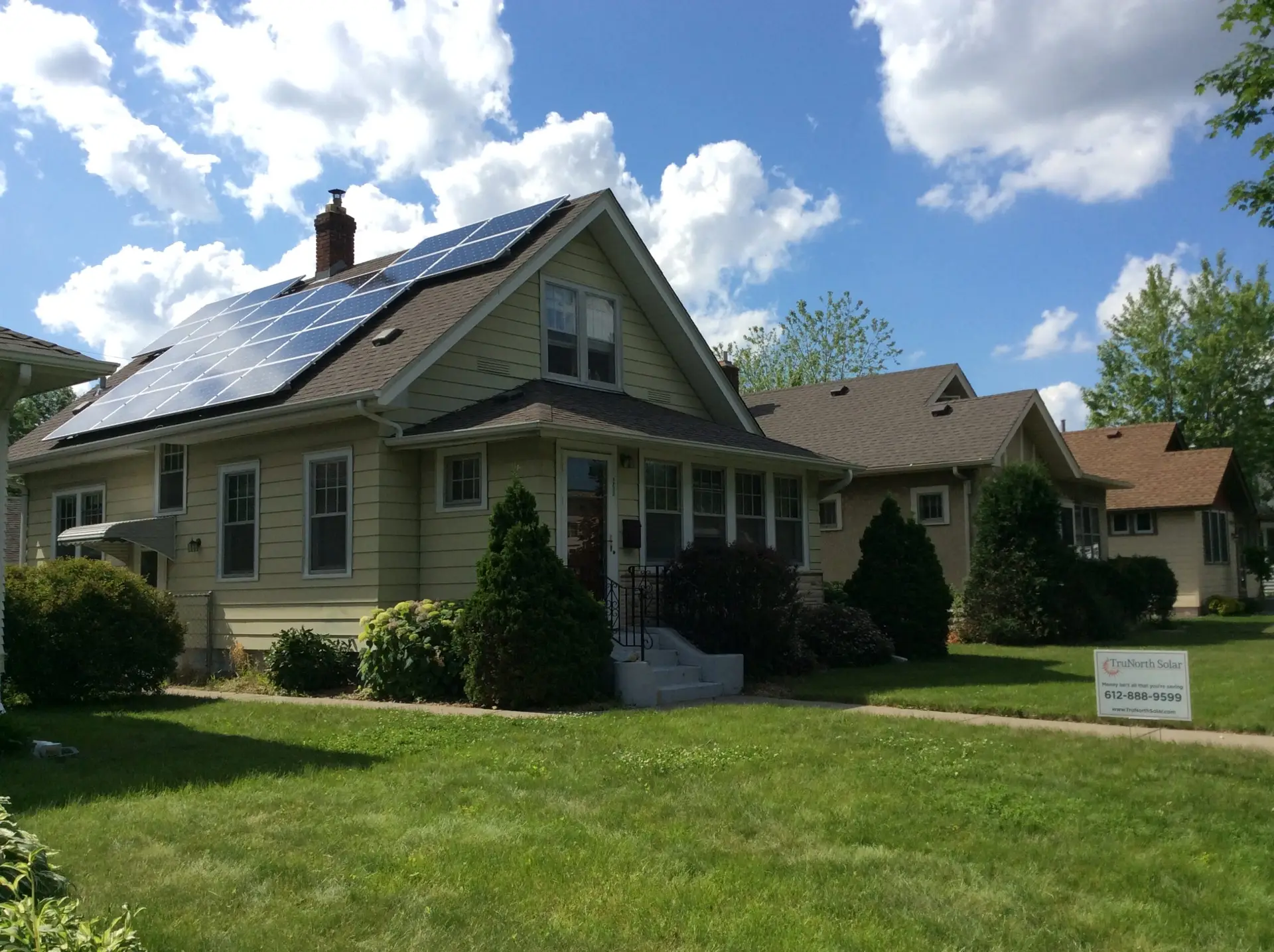 a house with solar panels on the roof