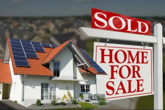 a house with solar panels on the roof