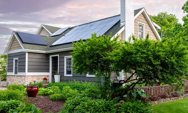 a house with solar panels on the roof