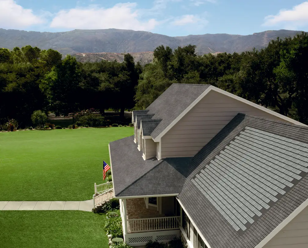 a house with a lawn and a flag