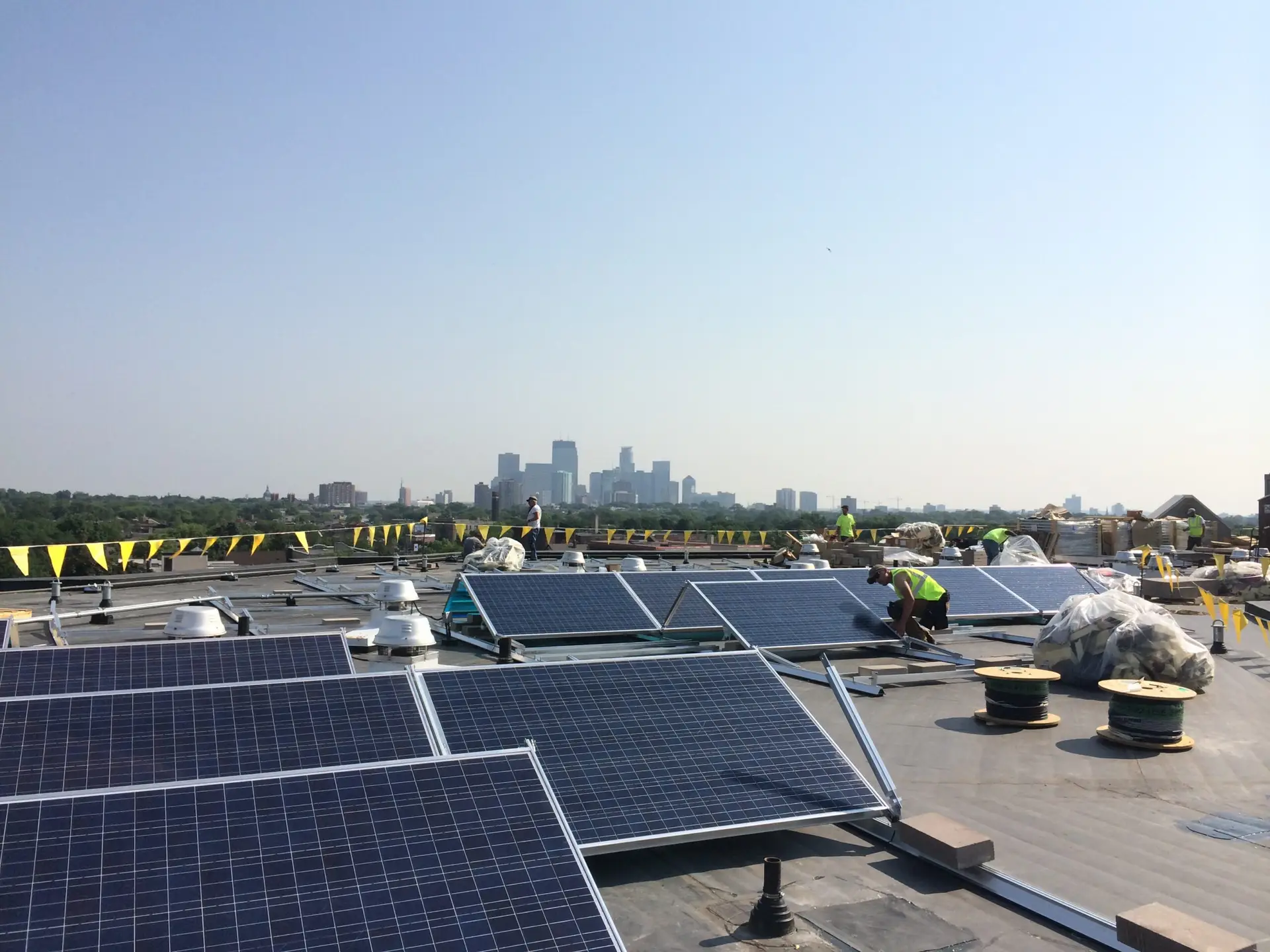 a group of solar panels on a roof