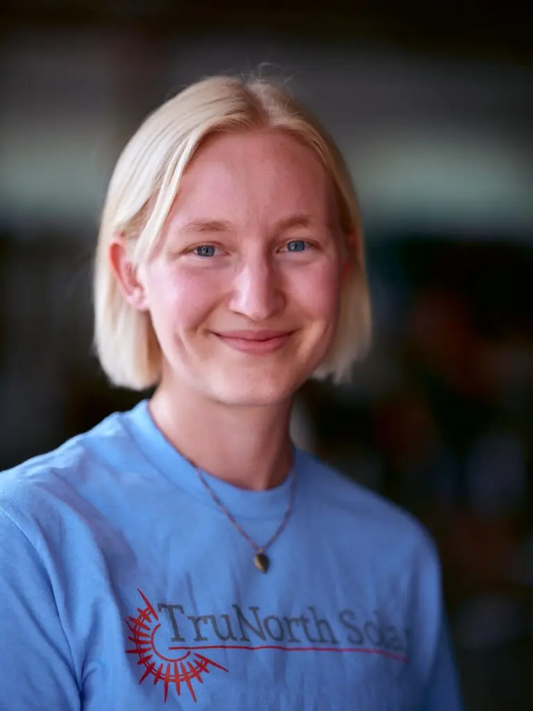 a woman smiling at camera