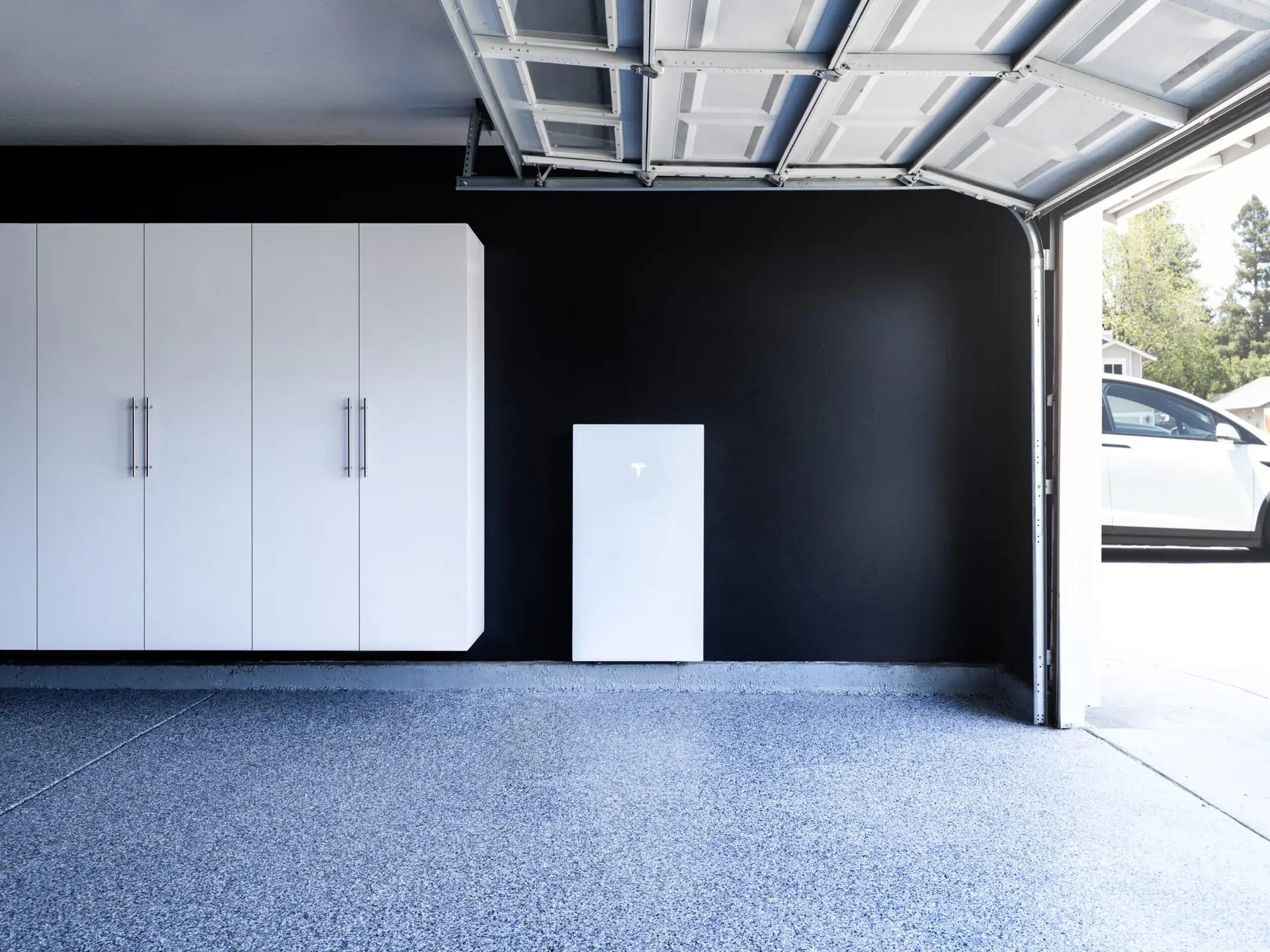 a white cabinet in a garage