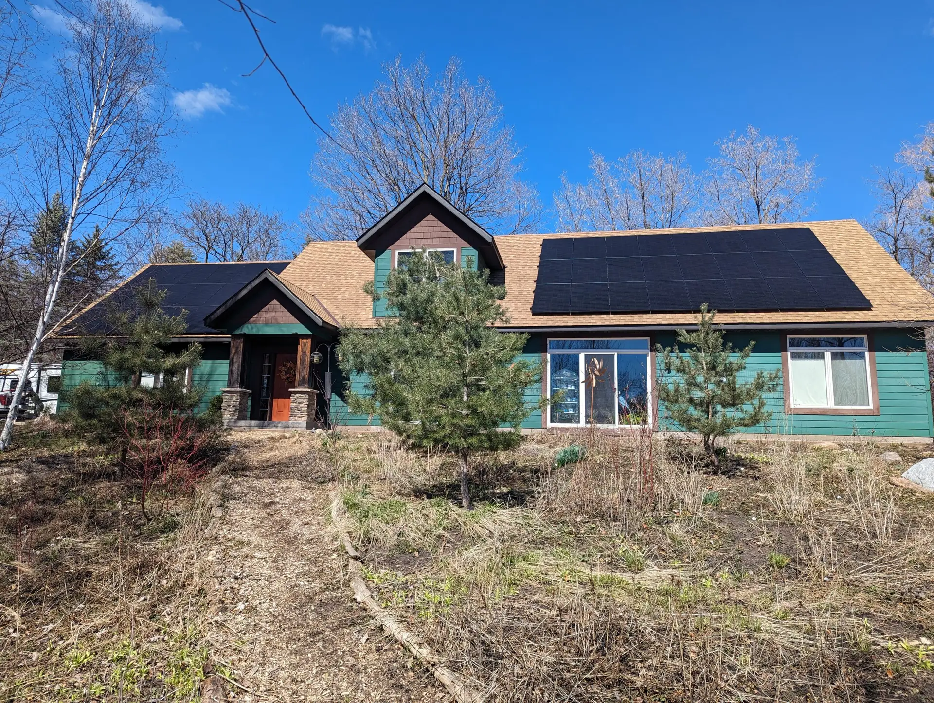 a house with solar panels on the roof