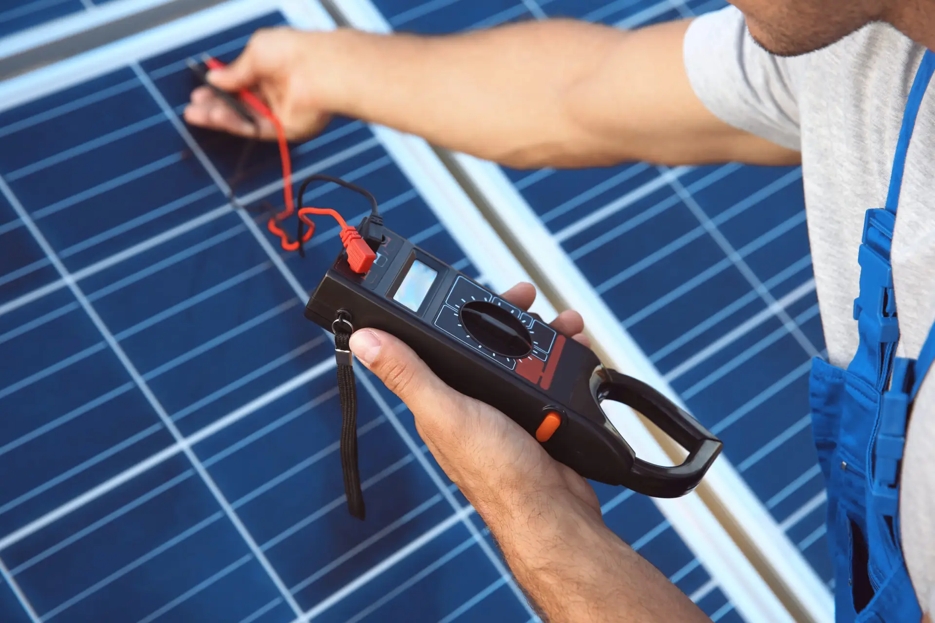 a man holding a solar panel