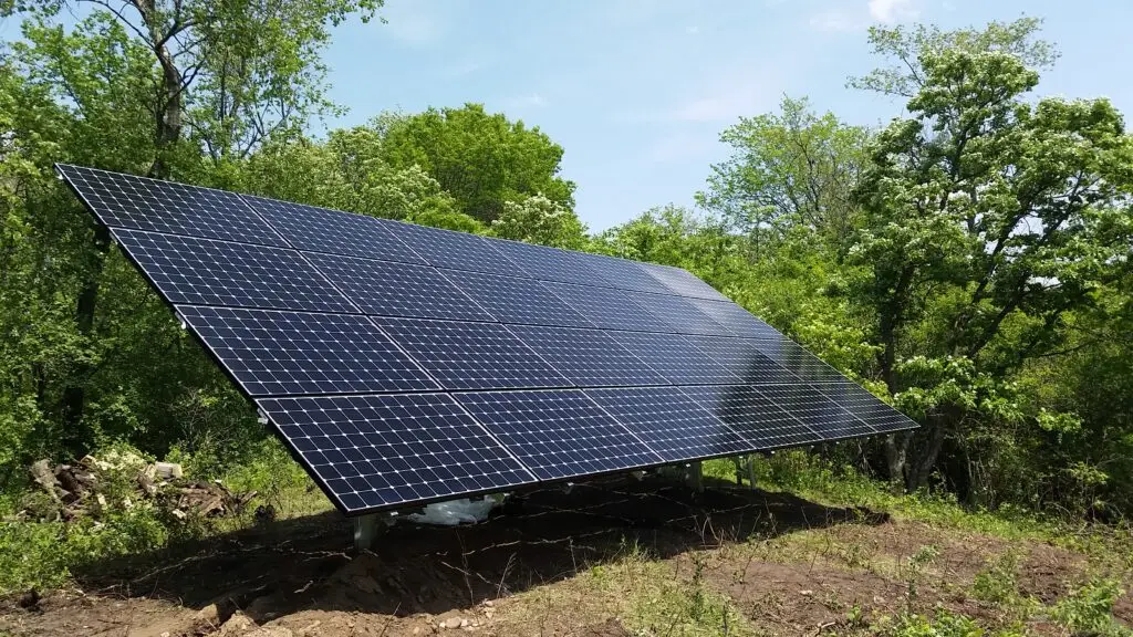 a solar panel in the woods