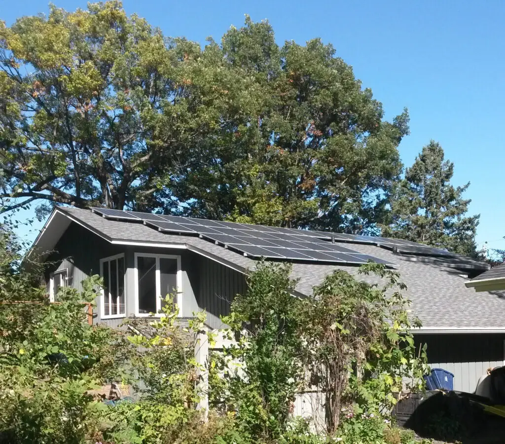 a house with solar panels on the roof