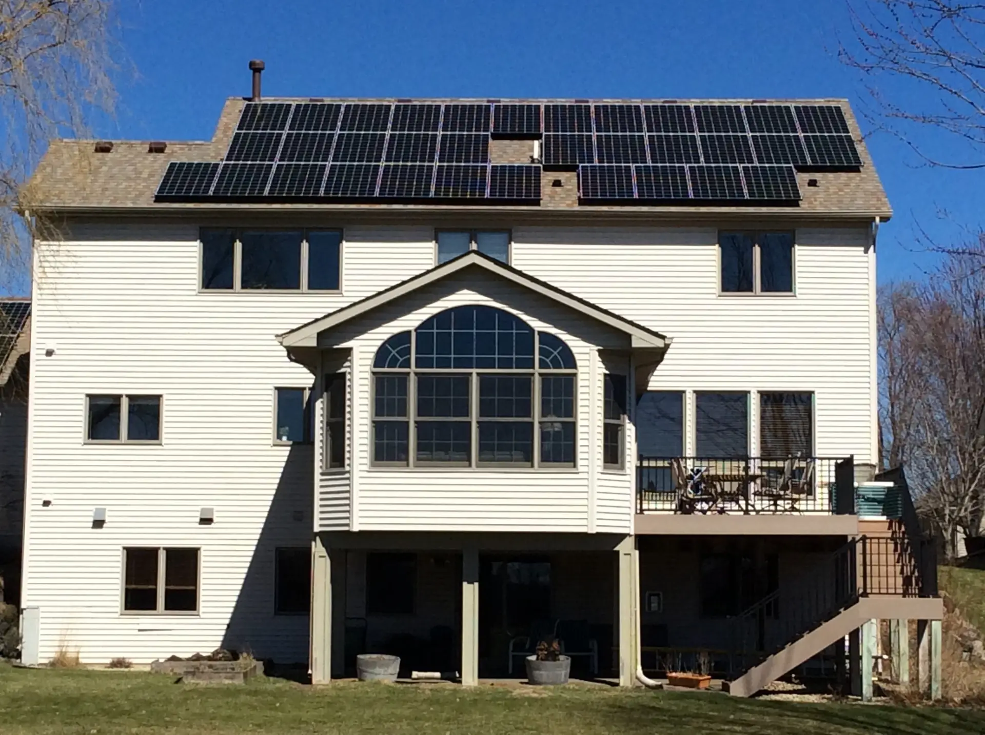 a house with solar panels on the roof