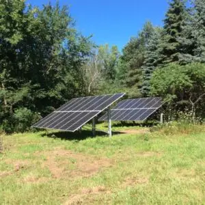 solar panels in a grassy area