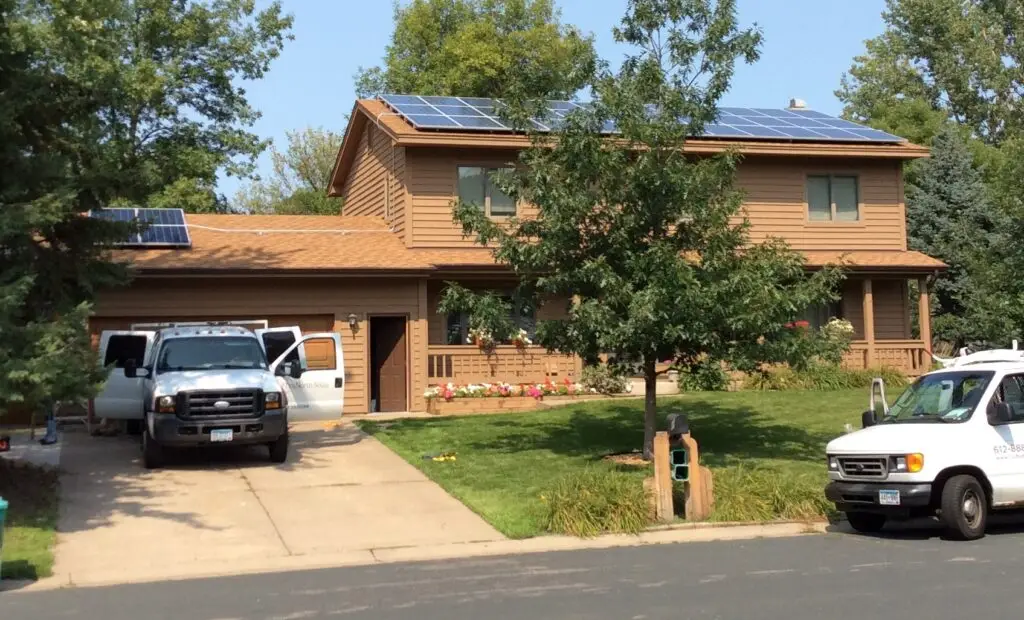 a house with a solar panel on the roof