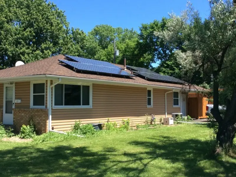 a house with solar panels on the roof