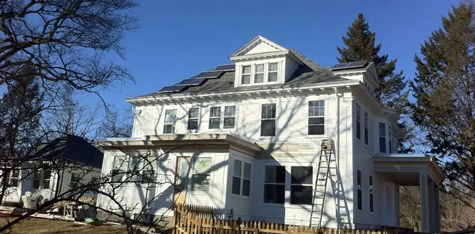 a house with solar panels on the roof