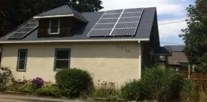 a house with solar panels on the roof