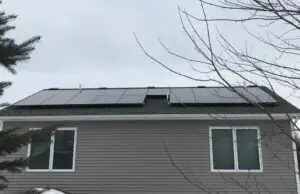 a house with solar panels on the roof