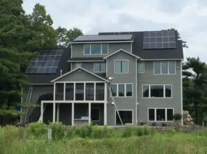 a house with solar panels on the roof