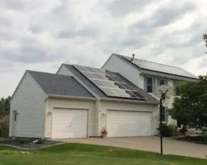 a house with solar panels on the roof