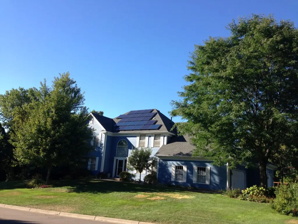 a house with solar panels on the roof